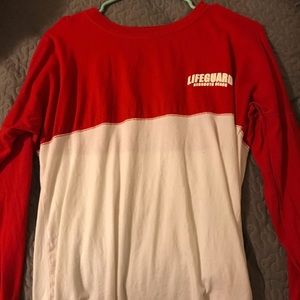 Red and white long sleeve shirt